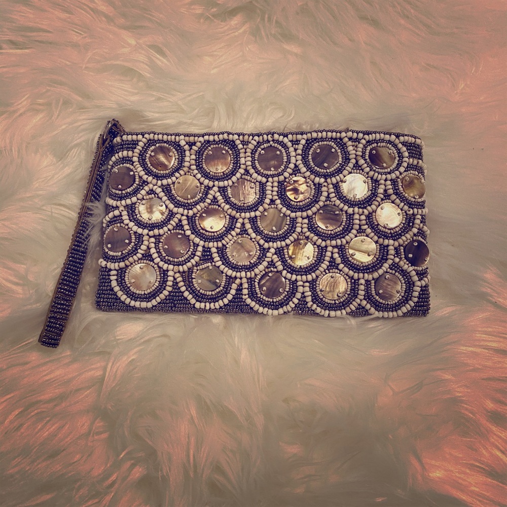 Shell detail wristlet